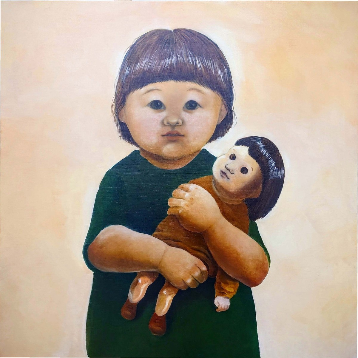 人形を抱く子供