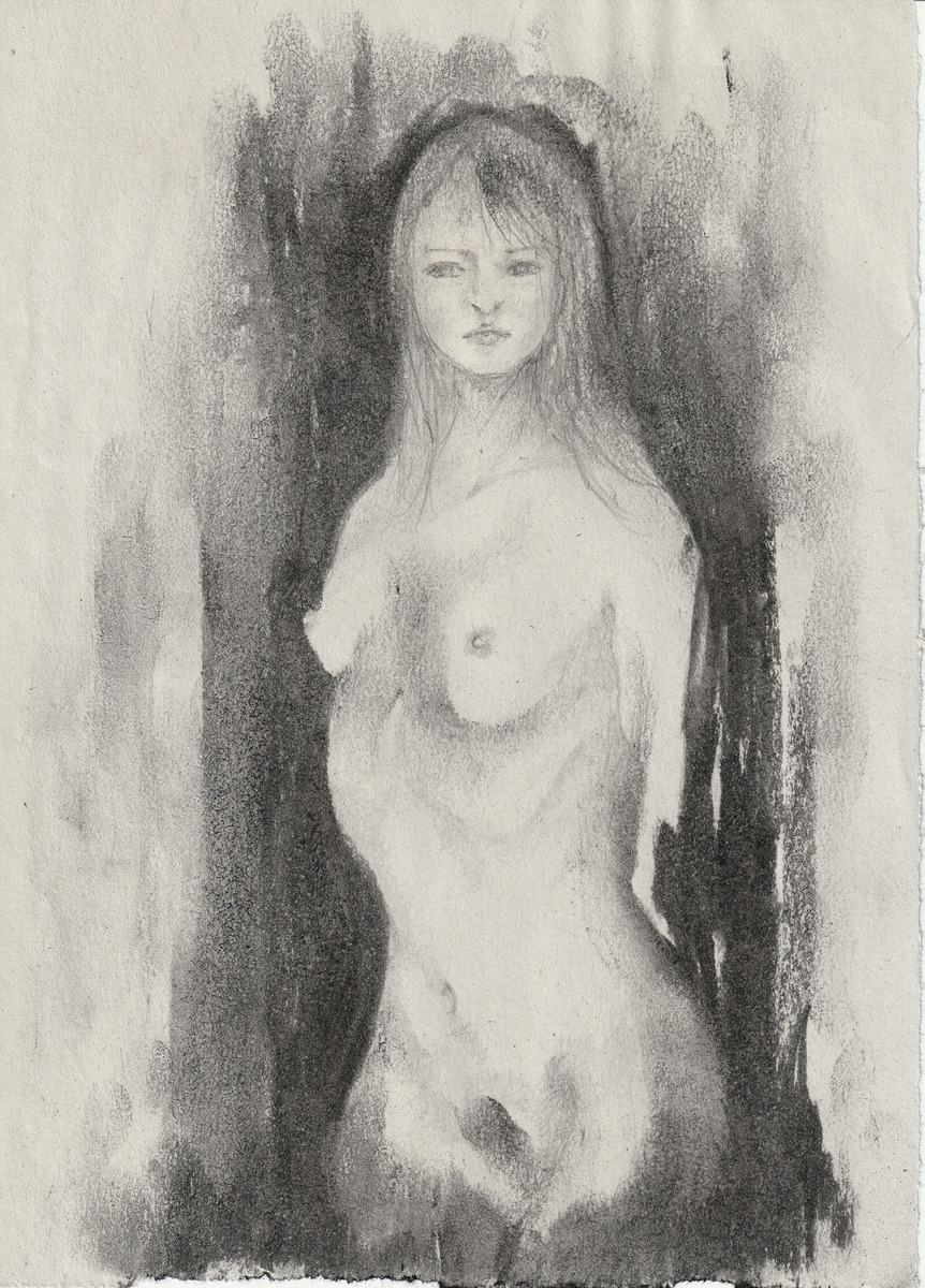 Woman standing in the dark