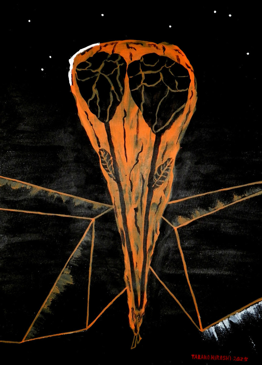 オレンジ色のビニールに包まれた花