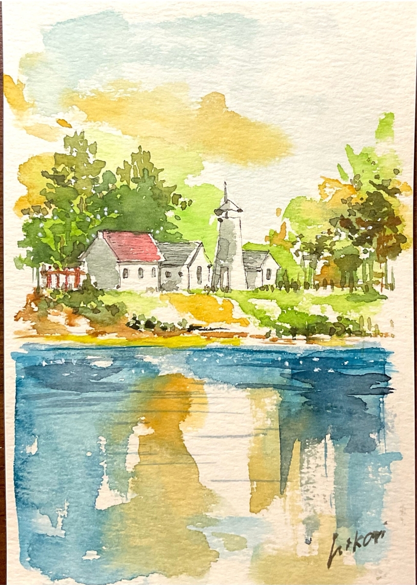 遠くの赤い屋根の家